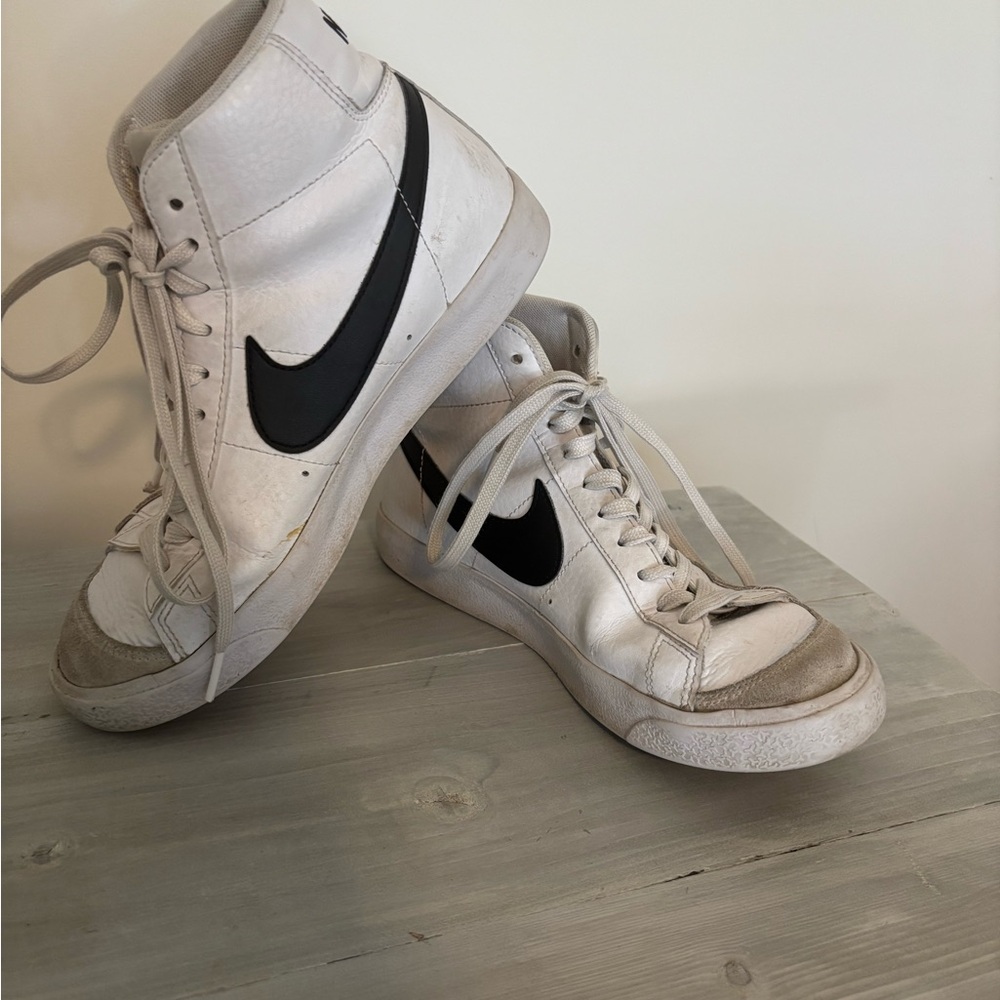 Nike White High-Top Sneakers. These have a lot of life left to live!